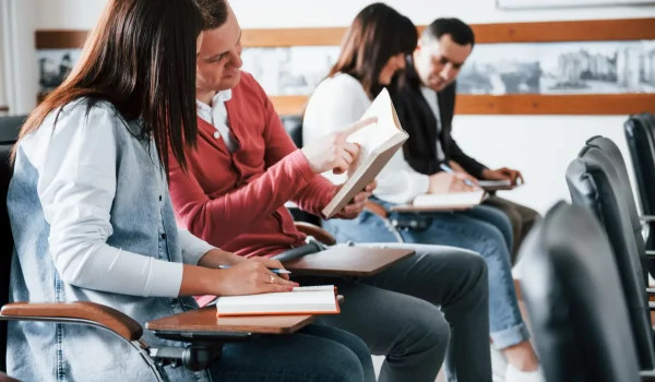 active-conversation-group-people-business-conference-modern-classroom-daytime active-conversation-group-people-business-conference-modern-classroom-daytime