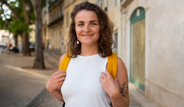 portrait-braless-woman-outdoors-with-backpack portrait-braless-woman-outdoors-with-backpack